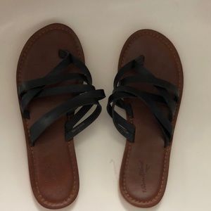 black strappy flip flop